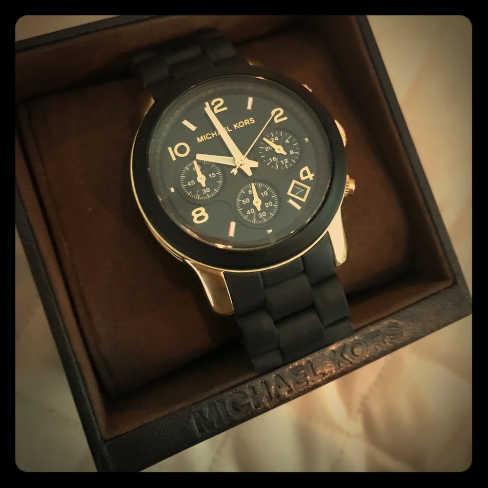 Sleek, black and gold Michael Kors watch!